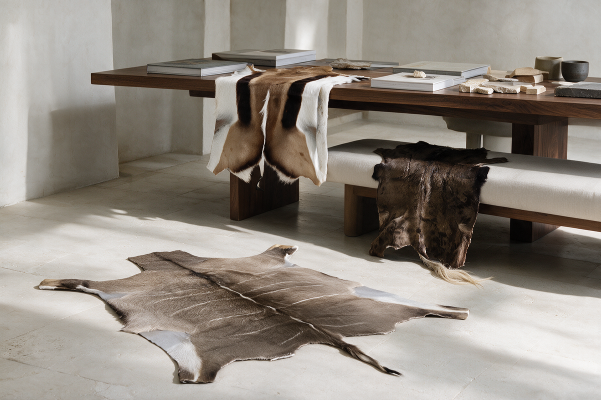 African game hides including kudu, springbok and wildebeest displayed in a luxury interior design studio