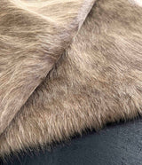 brown cowhide rug