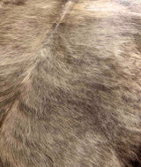 brown cowhide rug