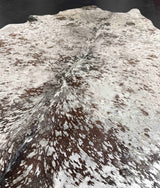 metallic silver cowhide rug
