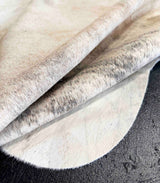 close-up of a natural gray brindle cowhide rug