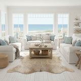 staged brown cowhide rug beach home