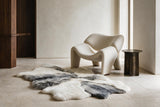 Gray and white multi-pelt Icelandic sheepskin rug in a luxury contemporary interior