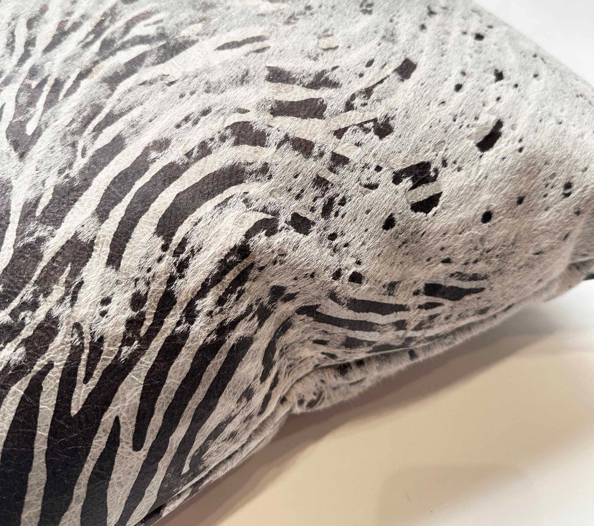 Close-up of serigraph zebra cowhide showing hair and printed hide texture