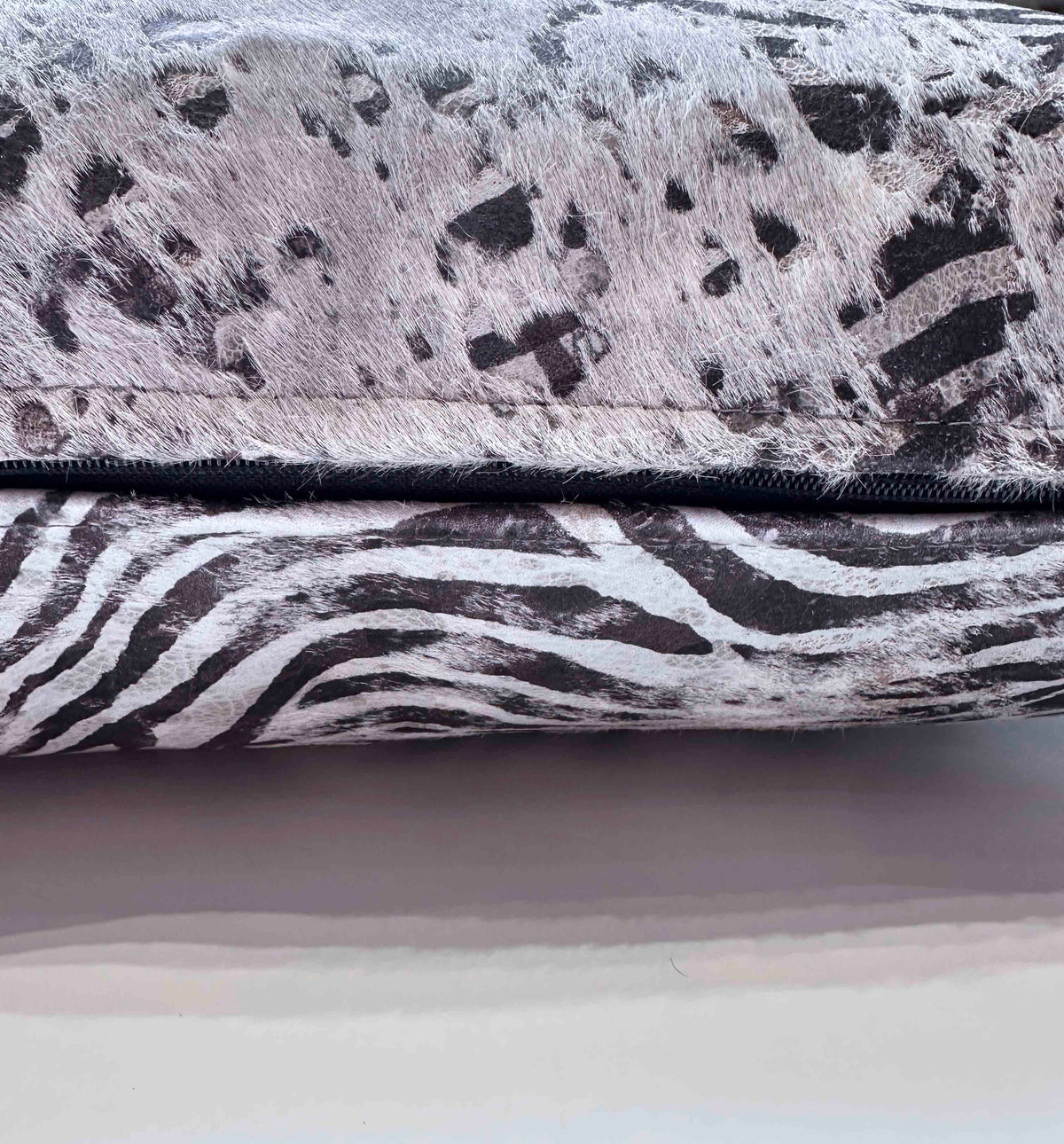 Serigraph zebra cowhide pillow detail with hidden zipper closure