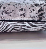 Serigraph zebra cowhide pillow detail with hidden zipper closure
