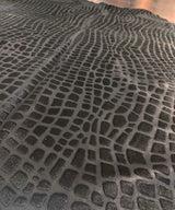 black crocodile rug