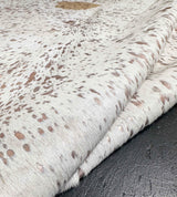 metallic gold cowhide rug