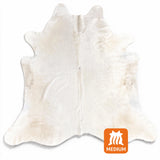 white cowhide rug