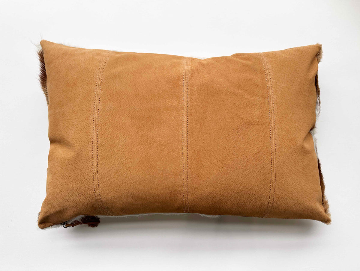 African springbok hide lumbar pillow with genuine leather backing and hidden zipper