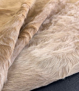 brown cowhide rug
