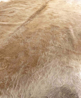 brown cowhide rug
