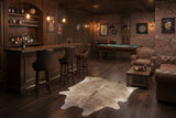 staged brown cowhide rug in man cave