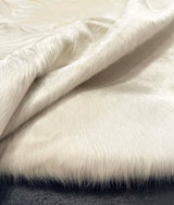 white cowhide rug