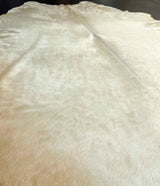 white cowhide rug