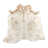 brown white cowhide rug