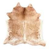 Brown cowhide rug on a white background