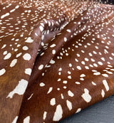 stenciled axis deer cowhide rug