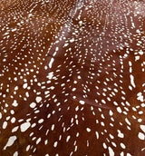 stenciled axis deer cowhide rug