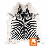 stenciled zebra cowhide rug