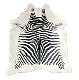 Stenciled Zebra On White Cowhide Rug