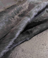 close-up of a black cowhide rug