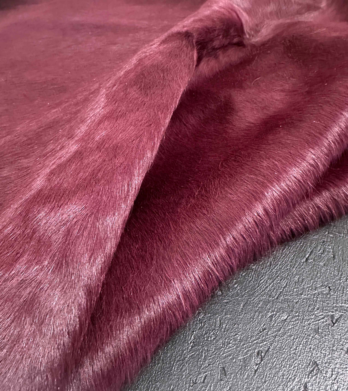 dyed purple cowhide rug