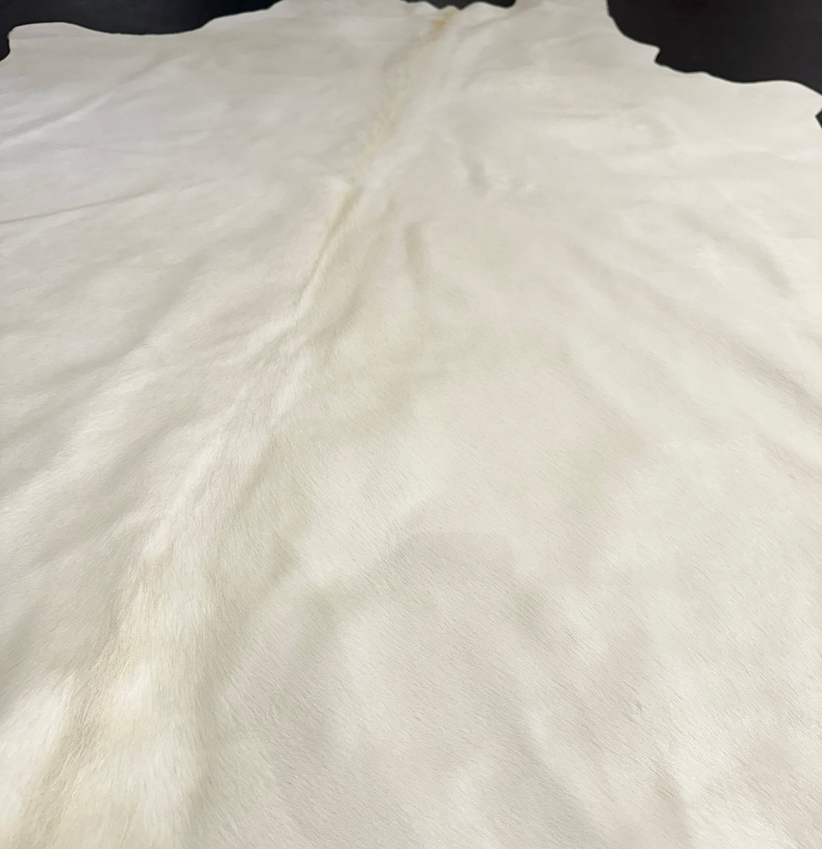 dyed white cowhide rug