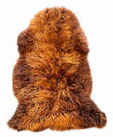 Luxury long wool sheepskin rug in natural ember tones