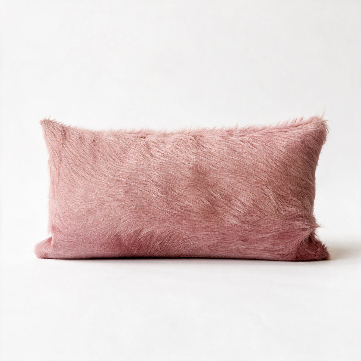Enchant pink cowhide lumbar pillow in 12 x 24 size
