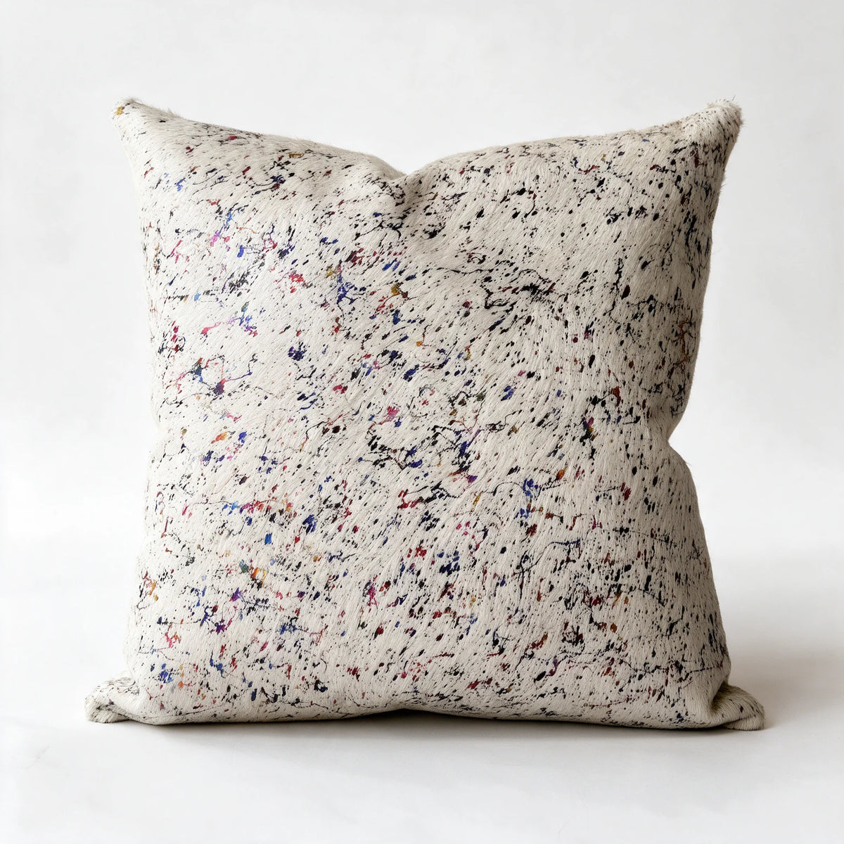 Iridescent cowhide pillow in 20 x 20 square size with multicolor abstract finish