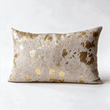Metallic gold and natural white cowhide pillow in 12 x 20 lumbar size