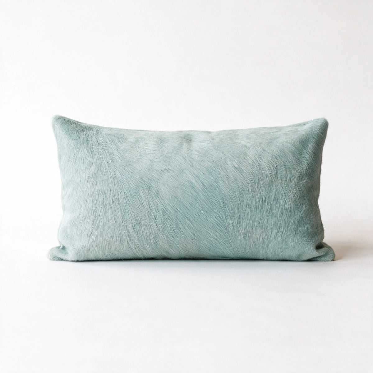 Sea Glass blue cowhide lumbar pillow in 12 x 24 size
