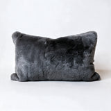 Charcoal gray Rex rabbit fur pillow with soft velvet-like texture