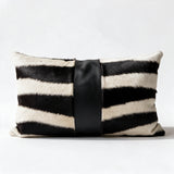 Authentic zebra hide pillow with black leather center accent