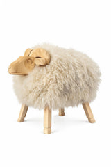 A sheep-shaped art with fluffy cream-colored ur and a natural light wood body, head, and legs, shown against a plain white background.