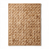 Tessaro custom stitched cowhide rug in warm caramel and champagne tones with an alternating basket-weave pattern