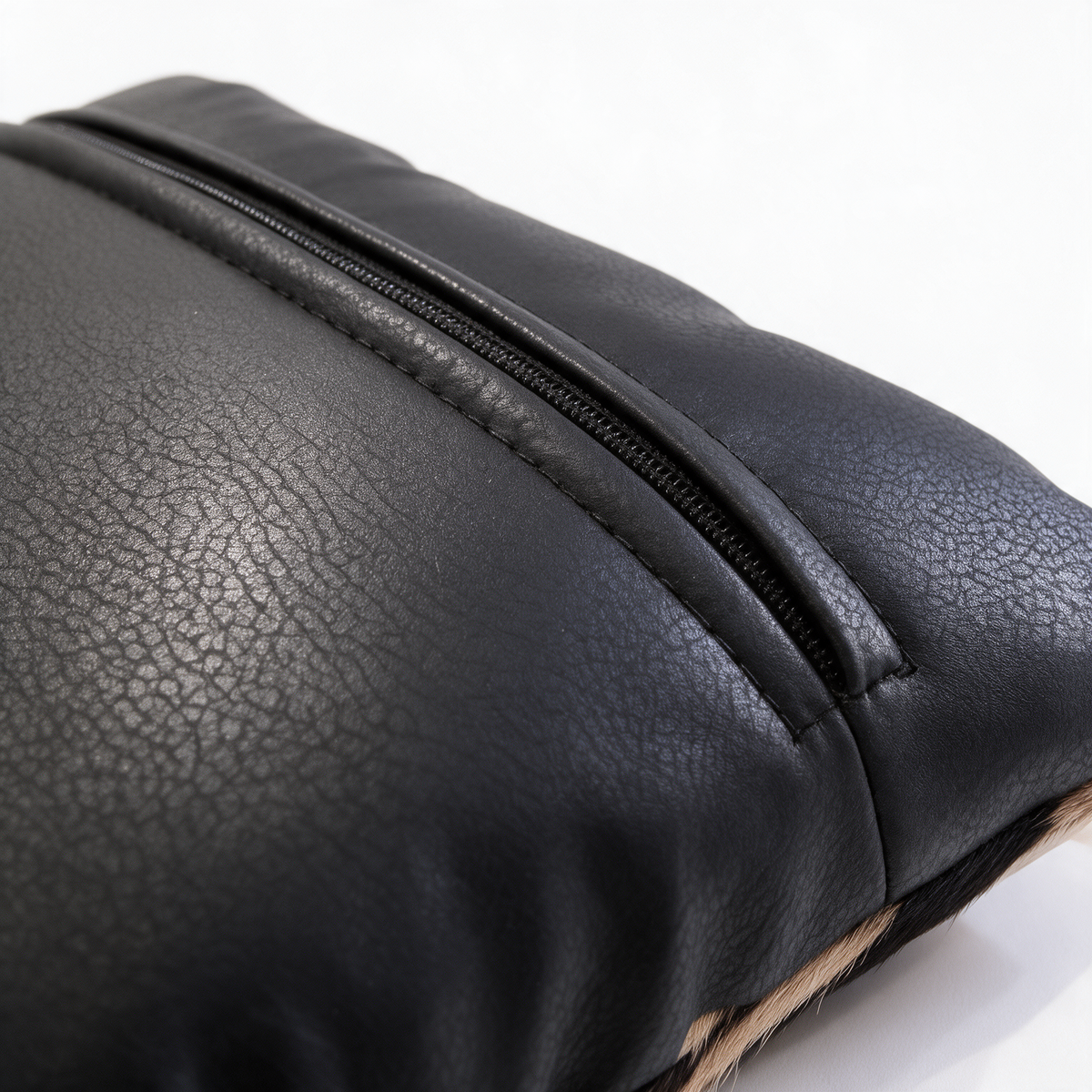 African zebra hide pillow with black leather-look backing and hidden zipper