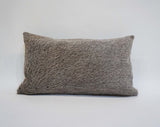 gray cowhide pillow