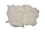 white sheepskin rug