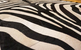 stitched zebra cowhide rug