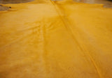 dyed Hermes orange cowhide rug