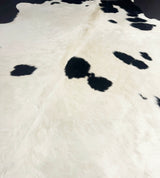 Close-up of a cowhide rug with black and white pattern
