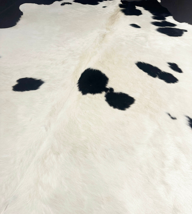 Close-up of a cowhide rug with black and white pattern