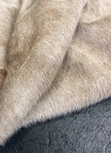 brown white cowhide rug