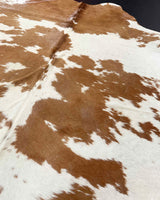 Close-up of a brown and white cowhide pattern