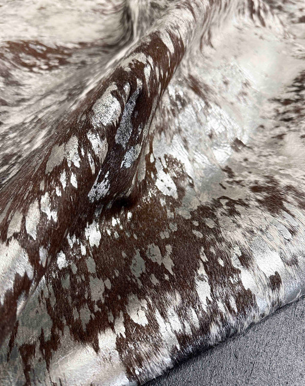 metallic silver cowhide rug