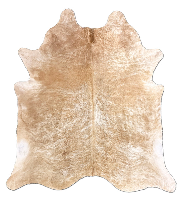Beige cowhide rug on a white background