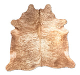 brown cowhide rug