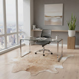 Modern office setup with glass desk, brown cowhide rug, and cityscape view.